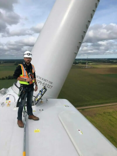 An engineering analysis performed by a geotechnical engineer atop a wind turbine