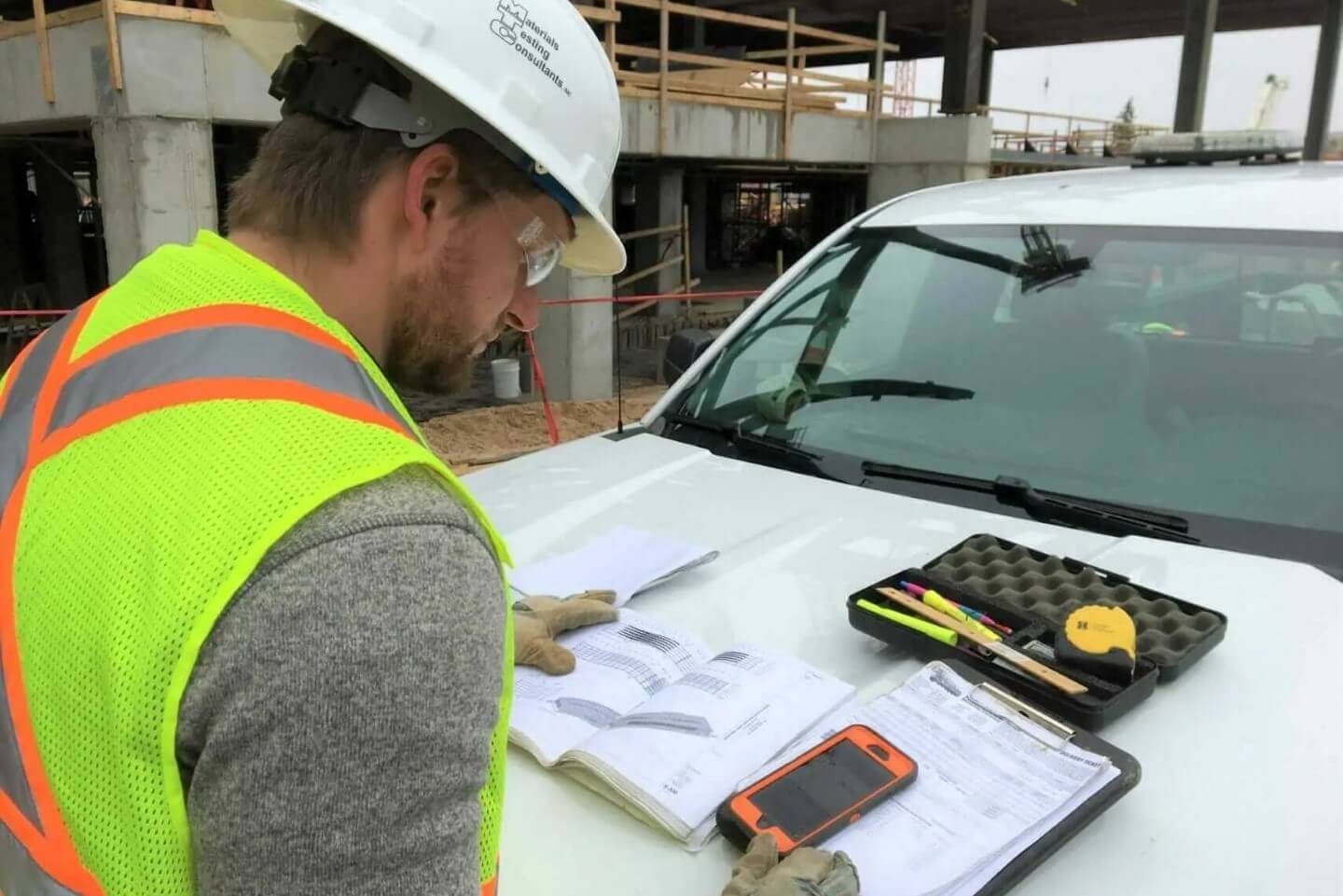 MTC field staff using geotechnical equipment for an environmental assessment