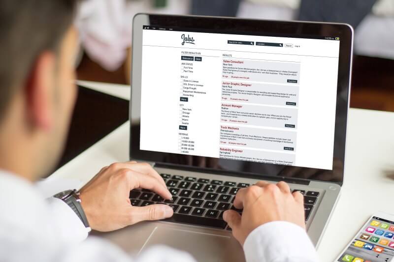 Man Utilizing one of several free job boards to view job postings