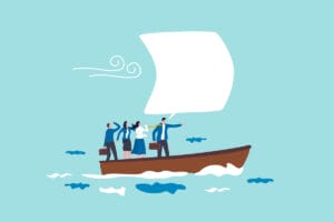 Team members in a boat signifying a positive onboarding experience