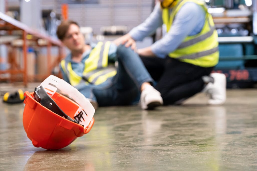 Image showing person who fell on the floor from a lack of slip, trip, and fall prevention measures