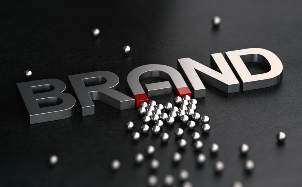 Illustration of the word brand as a magnet, representing employer branding attracting employees