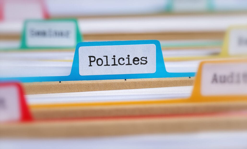 Folders including one that says policies